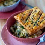 Golden, crispy puff pastry filled with creamy chicken and leek filling, creating the perfect pie.
