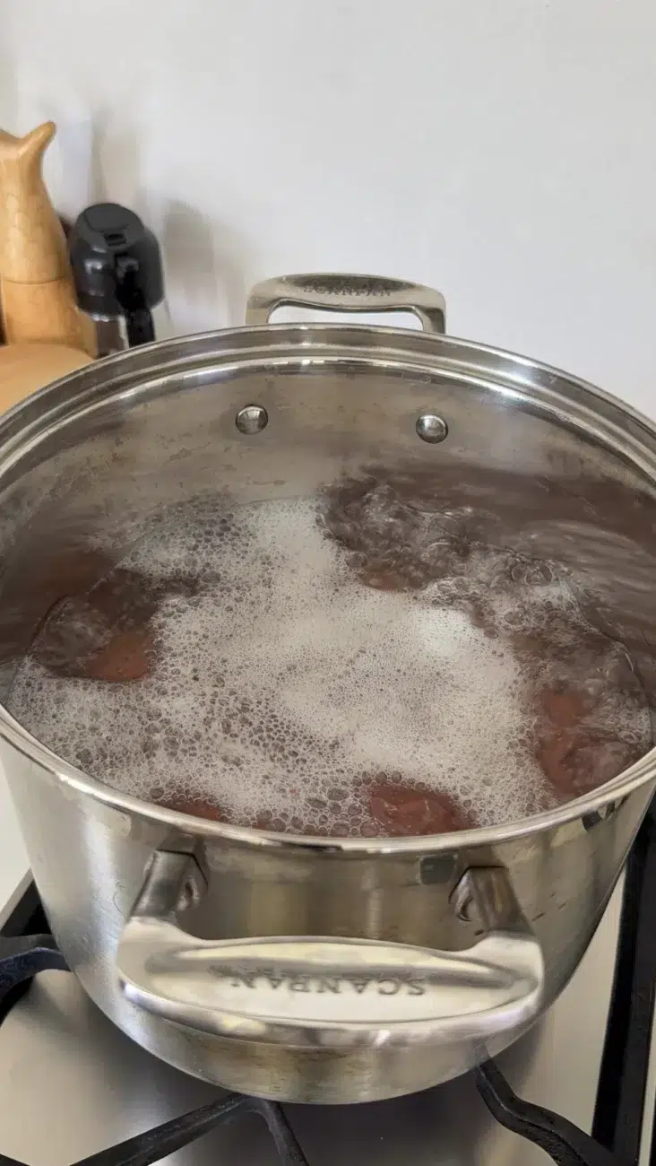 Hasselback Potato being pre boiled
