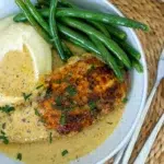 Creamy Garlic Chicken plated with mash potato and green beans
