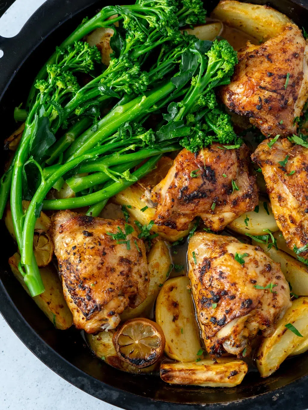 Close up of one pan lemon garlic chicken and potatoes