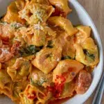 Close up of Spinach & Ricotta Tortellini with Creamy Tomato Sauce Recipe
