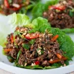 Juicy Thai Beef Lettuce Cups on a white plate