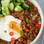 Vietnamese Sticky Pork Bowls, served with cucumber and fried egg