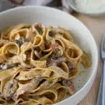 Creamy Mushroom and Bacon Pasta in deep bowl