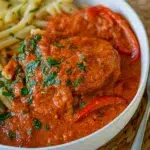 Close-up of Chicken Paprikash on a white plate