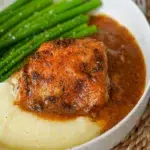 Close-up of one-pan Baked Chicken and Gravy in a plate