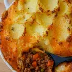 Freshly baked Shepherd's Pie showcasing its creamy potato crust.