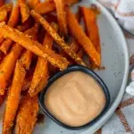 Sweet potato fries with a rich and tangy gochujang mayo on the side.