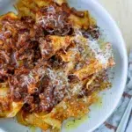 Warm and comforting slow cooker beef ragu with a rich, deep color.