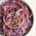 Completed dish of tangy sumac onions ready to serve