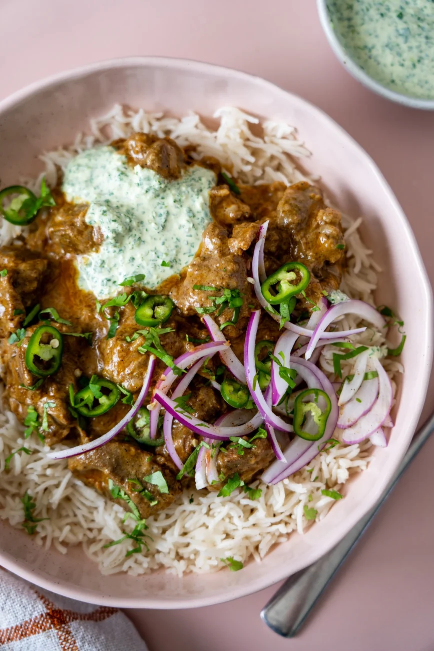 Serving of Lamb Korma in a pink bowl