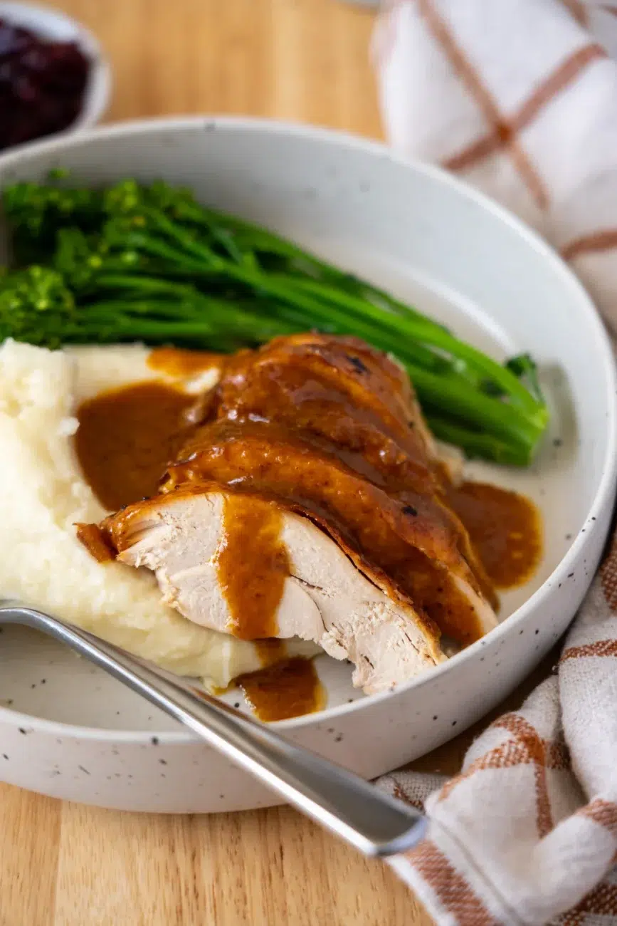 Serving of Roast Turkey Breast with Potato Mash and Greens