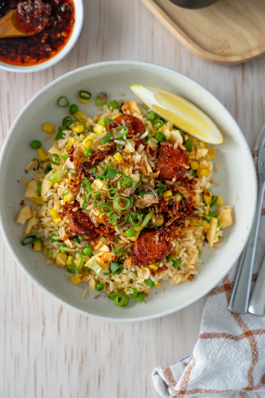 serving of chorizo fried rice with lemon