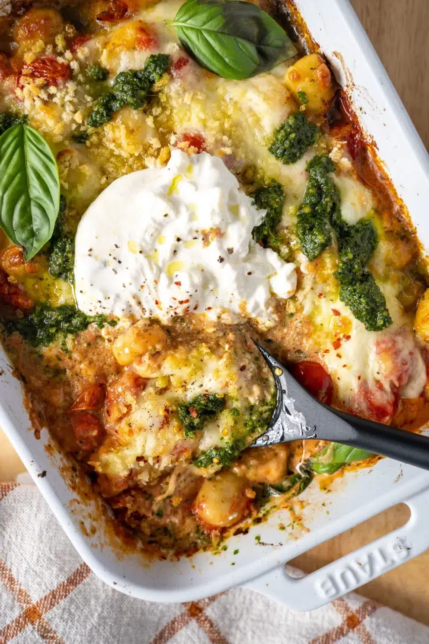 Spoon digging into Pesto Gnocchi Bake