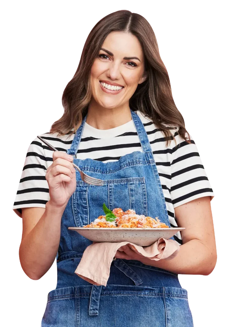 Nicole Maguire of Simple Home Edit with a fork in hand