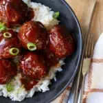 Finished meatballs close-up plated up with rice