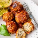 Closeup meatballs plated and cut open
