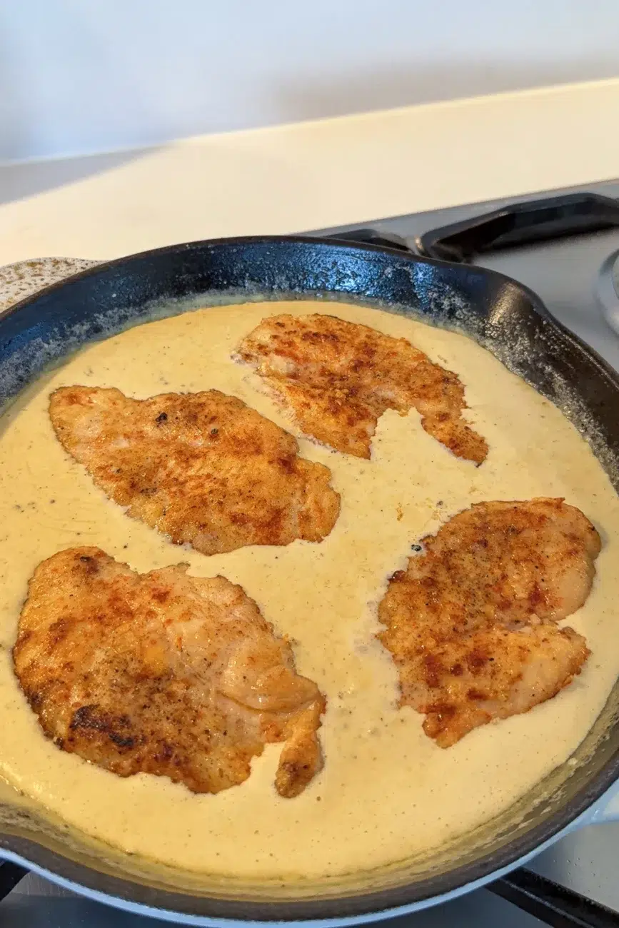 Chicken Simmering in Creamy Mustard Sauce
