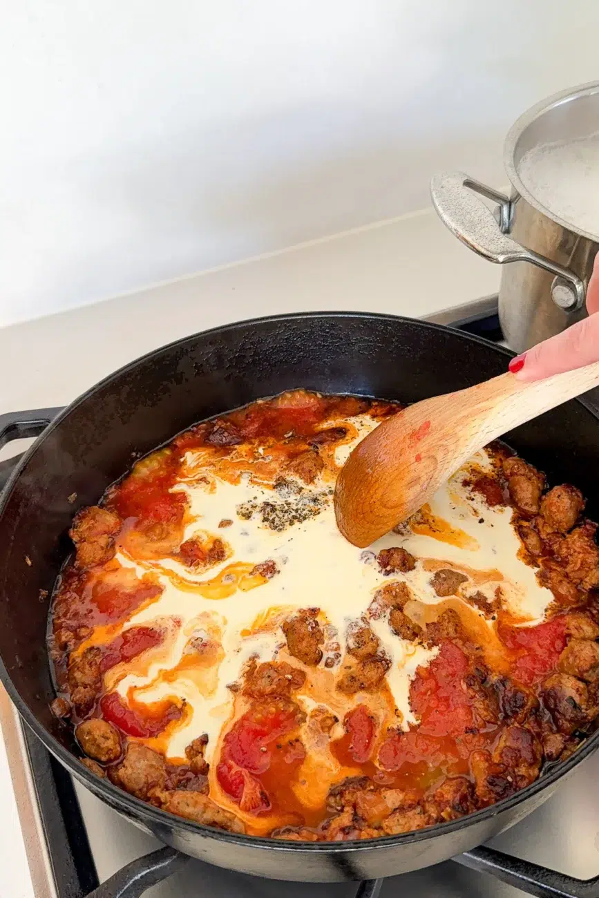 Cream and seasoning added to sauce