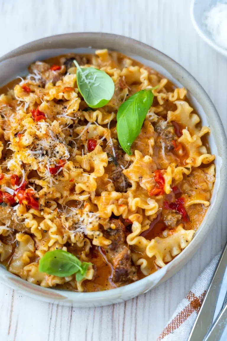 Creamy tomato pasta recipe with parmesan cheese and chilli
