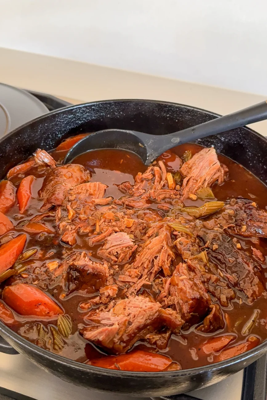 Finished beef pot roast shredded