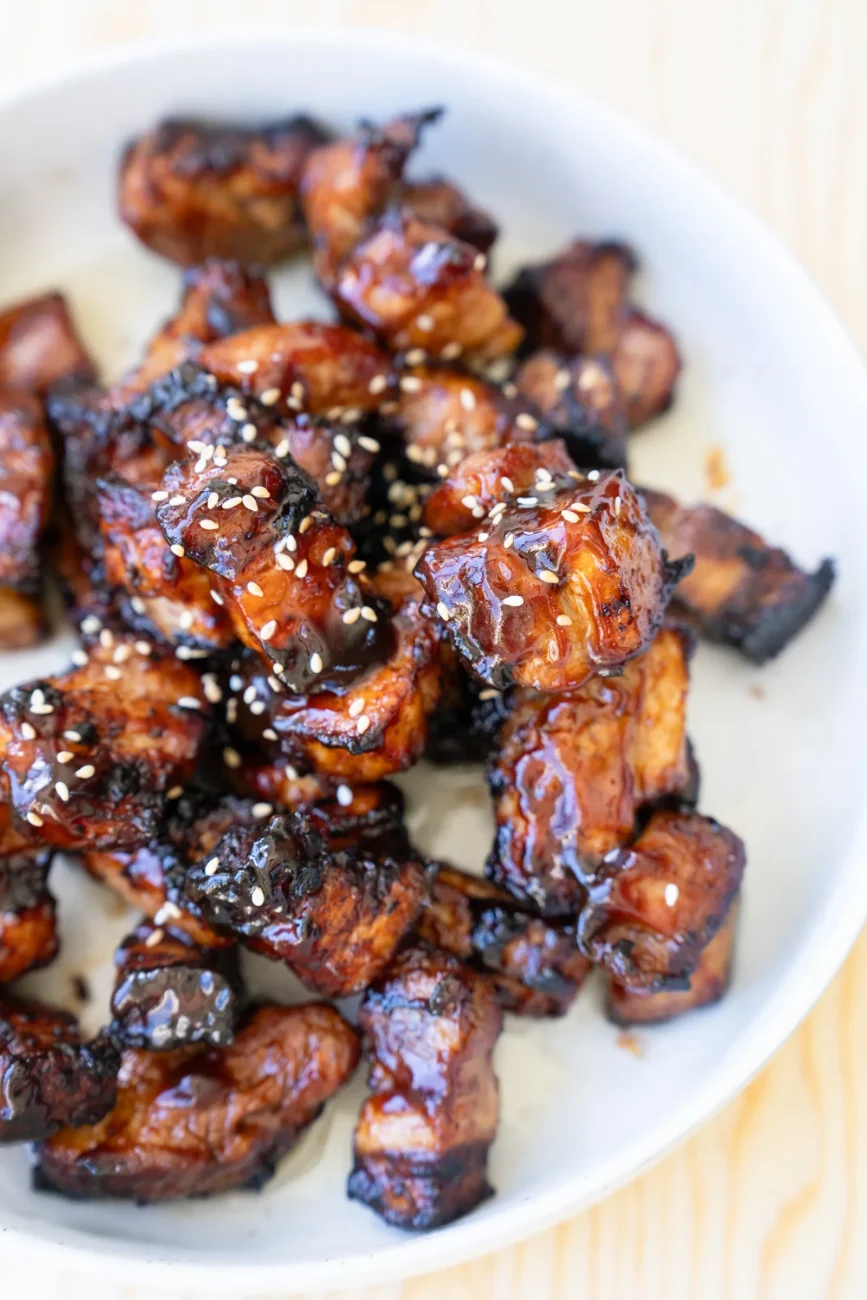 Pork belly bites fresh out of air fryer plated on platter