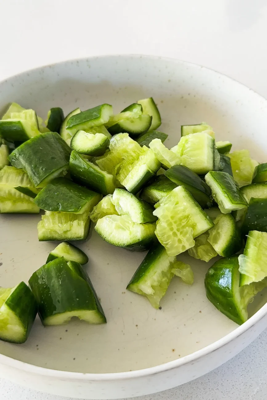 Smashed cucumbers ready for other ingredients
