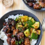 Two bowls Pork belly bites plated