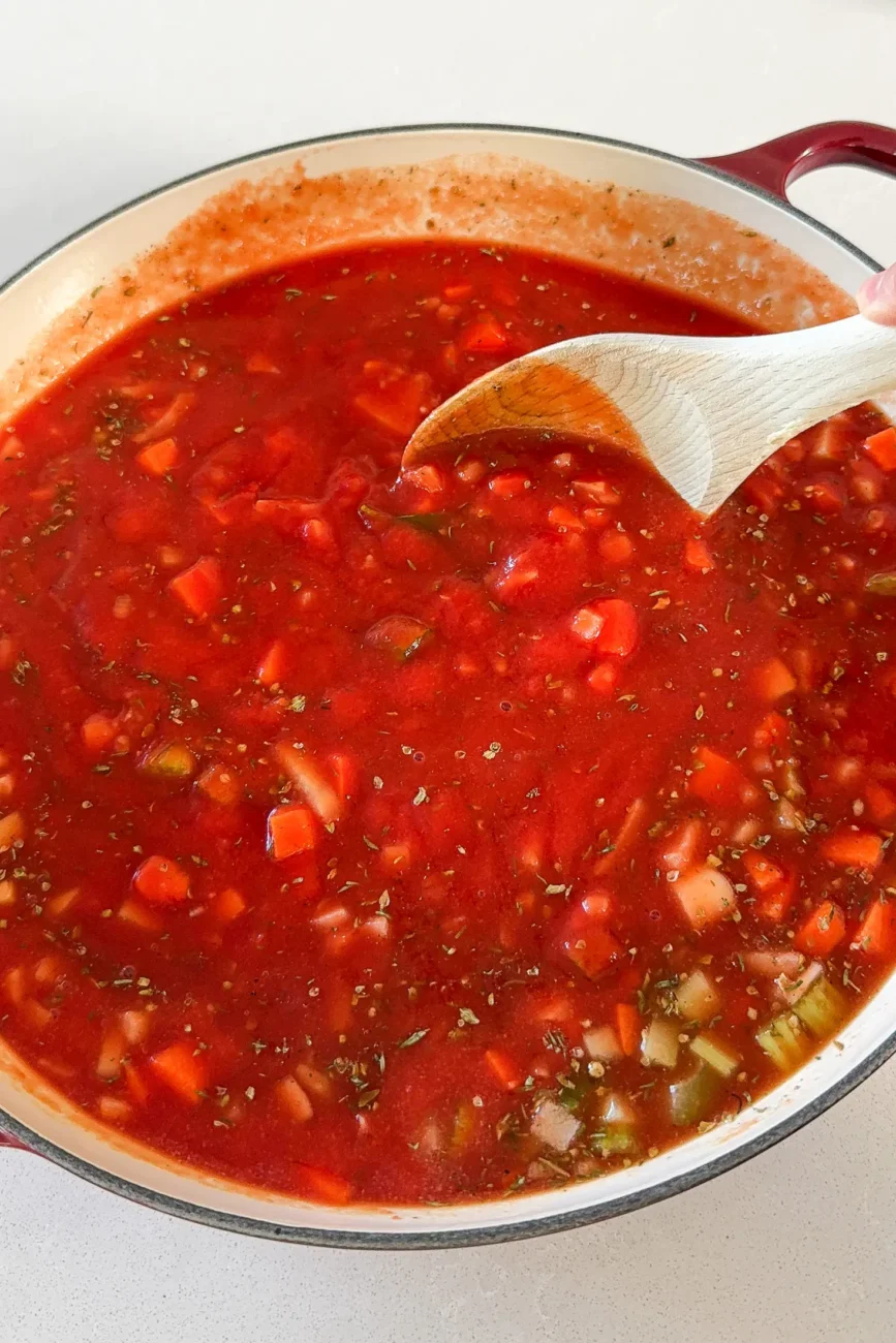 beef ragu sauce mixed in casserole dish