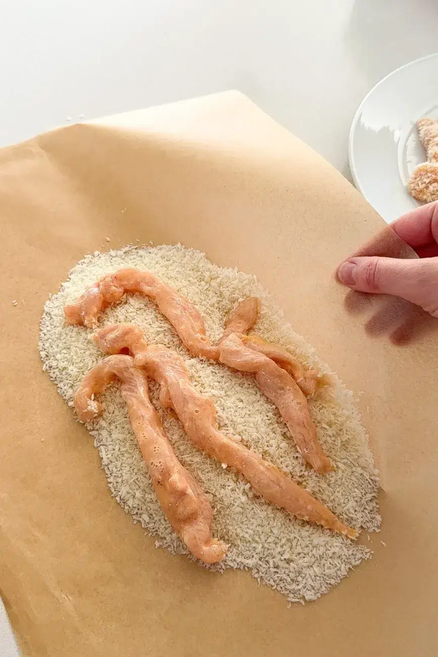 chicken fingers added to panko breadcrumbs
