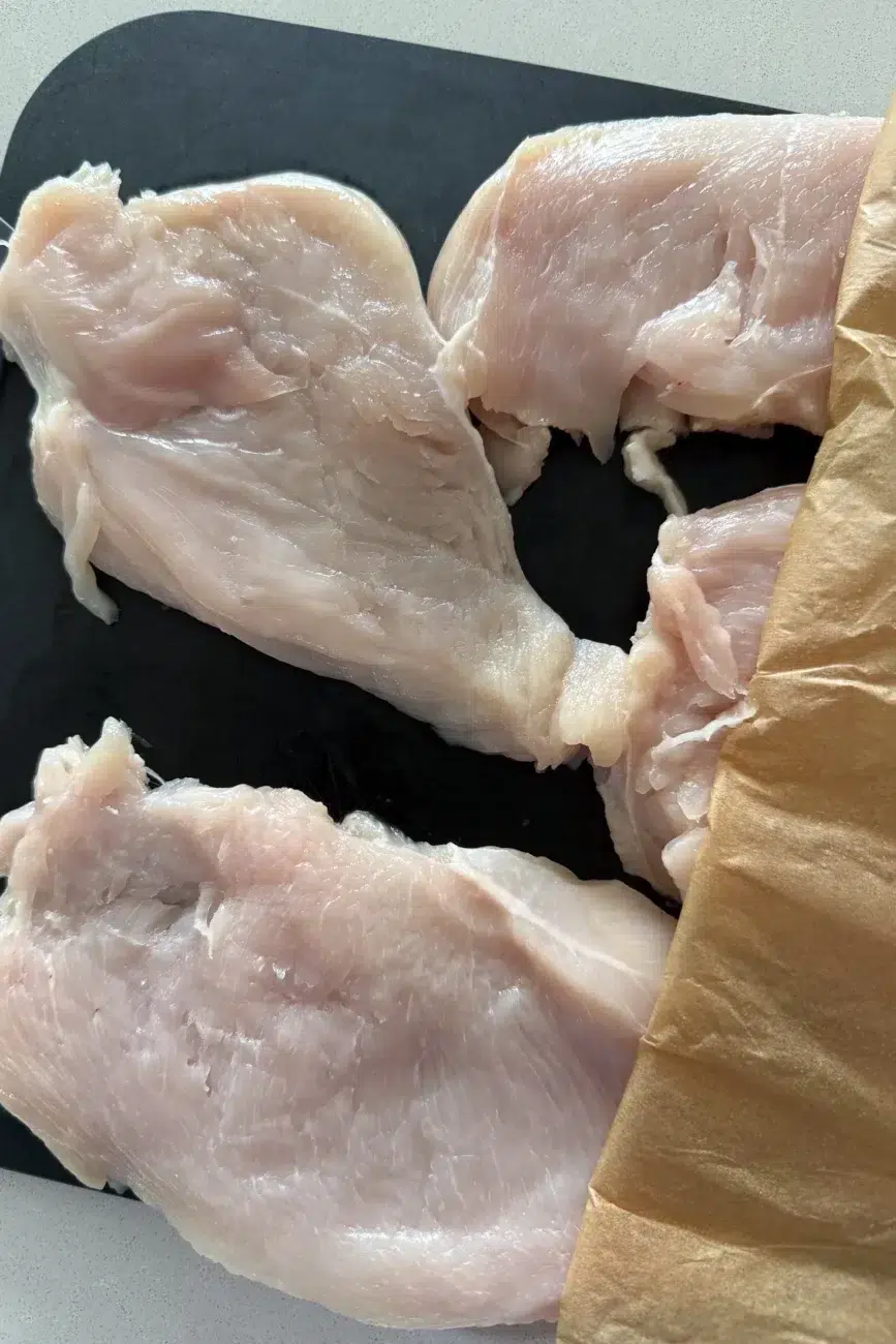Chicken after being pounded to an even thickness