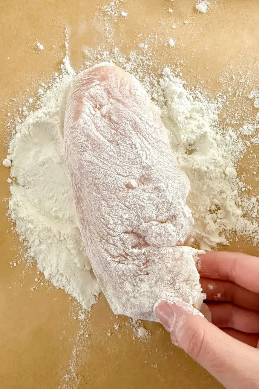 Chicken dipped into flour before egg and breadcrumbs