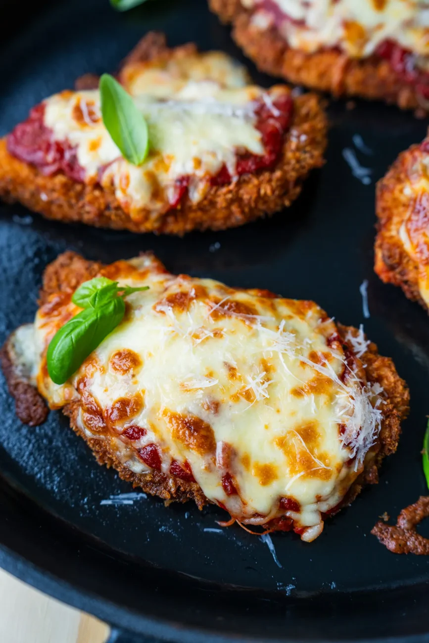 Chicken parmigiana in pan after being cooked