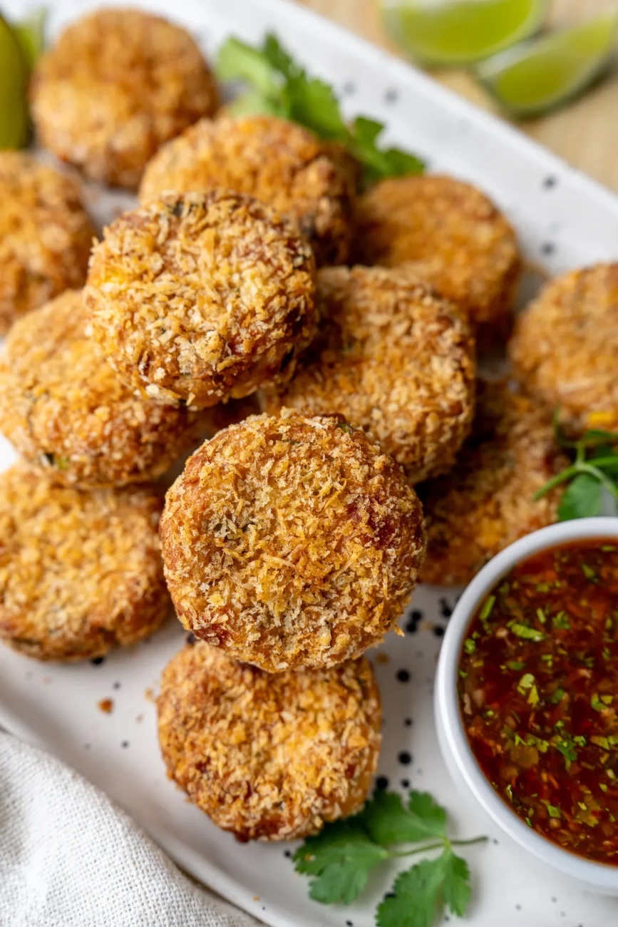 Fish cakes with dipping sauce on side