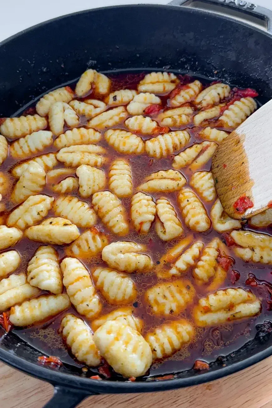 Gnocchi and stock cooking