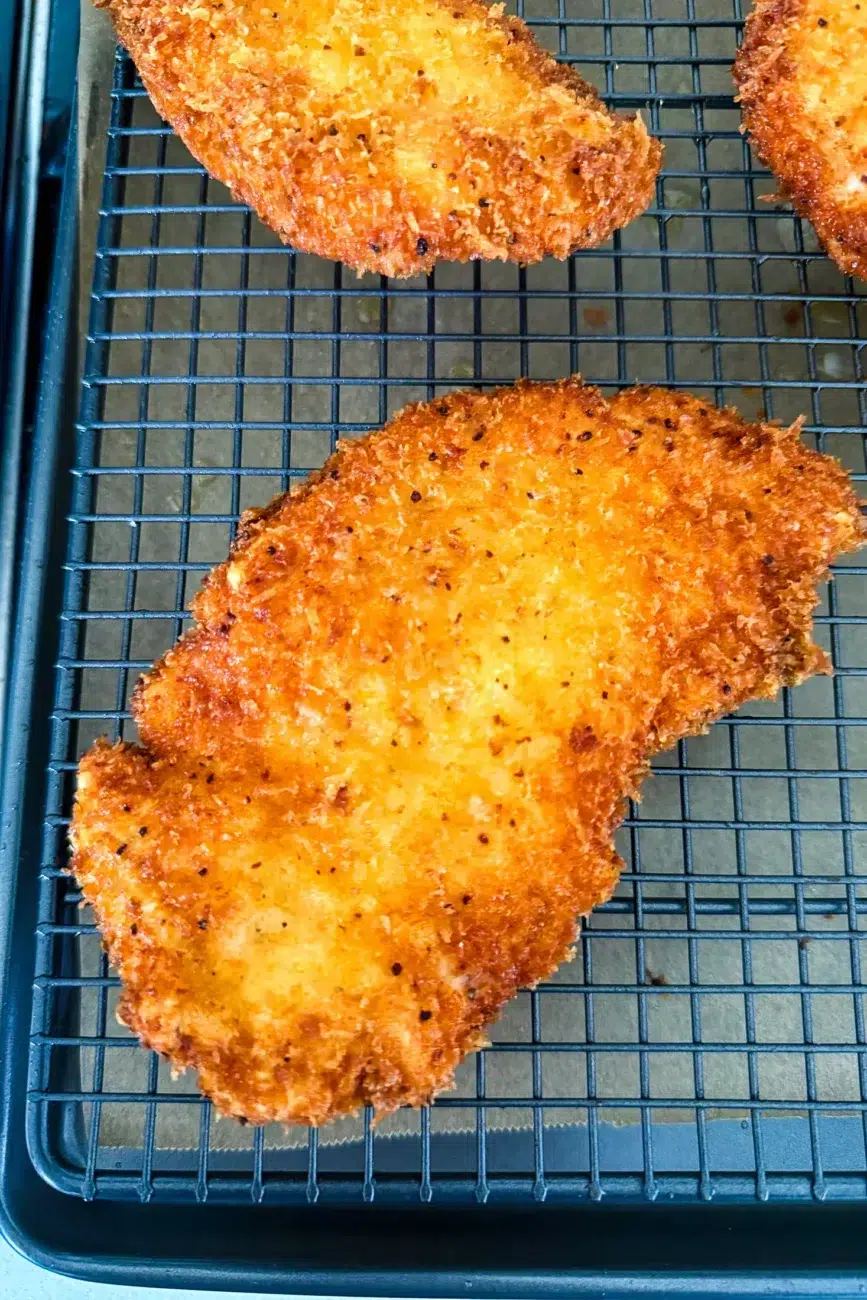 Golden fried chicken schnitzels after cooking