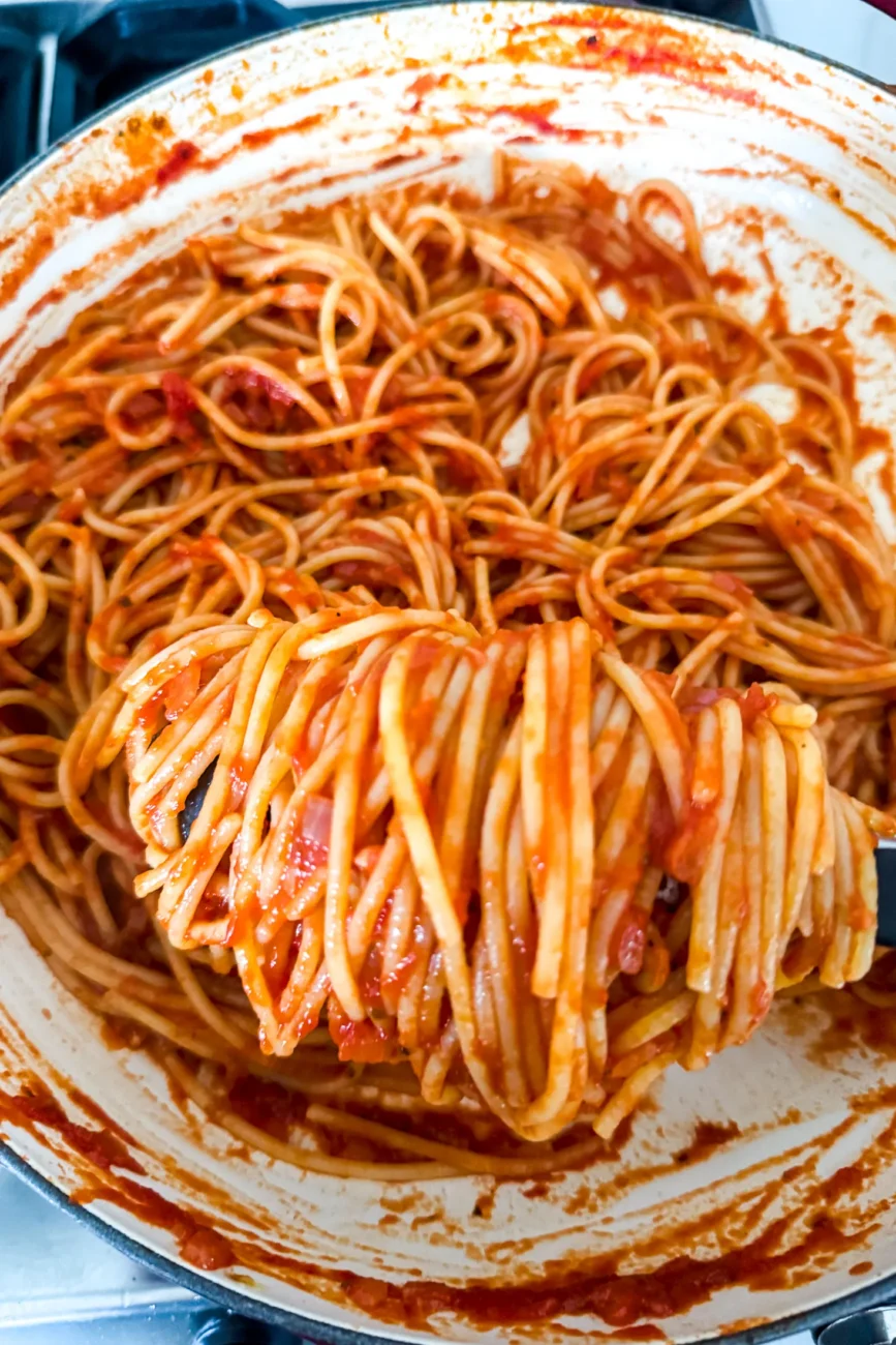 Spaghetti tossed through homemade tomato and basil sauce