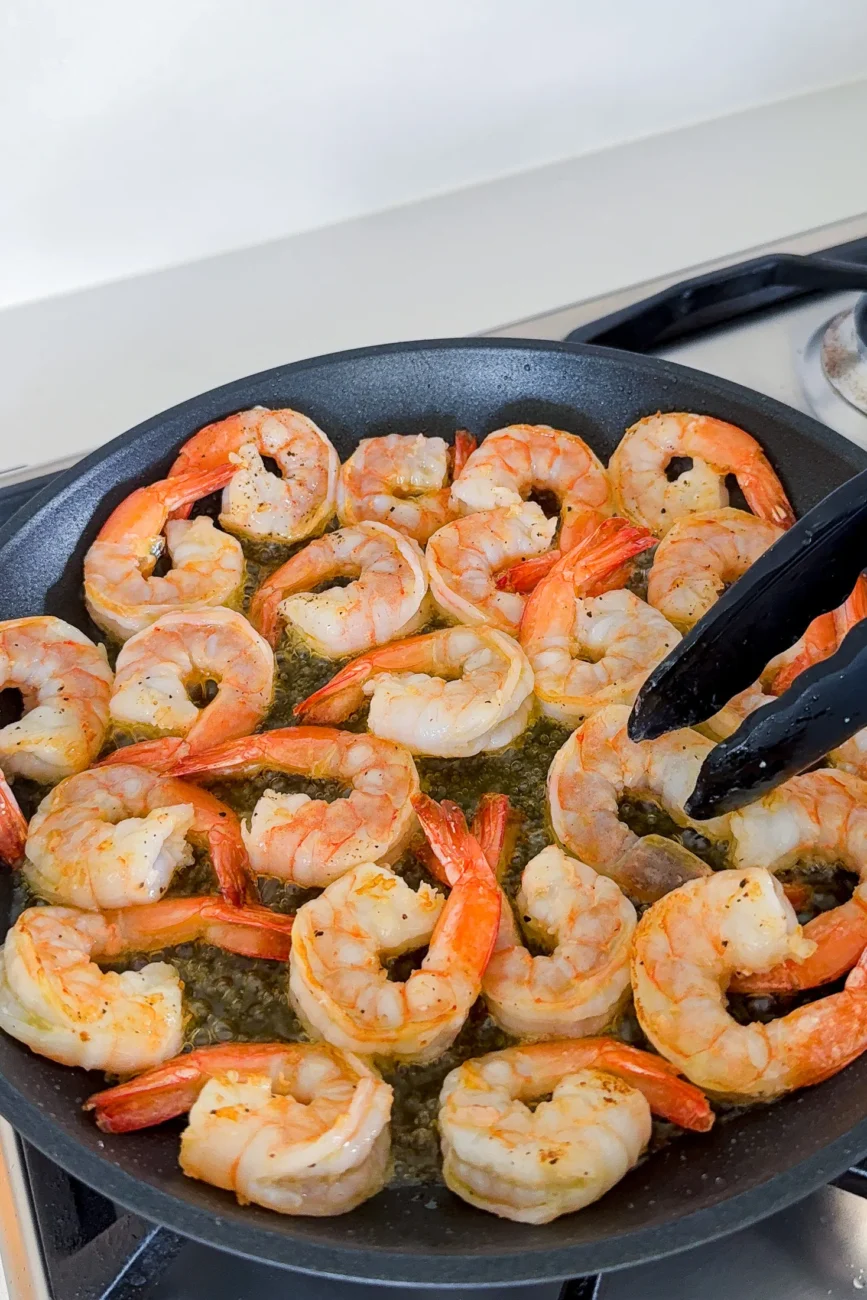 The prawns quickly being cooked and changing colour