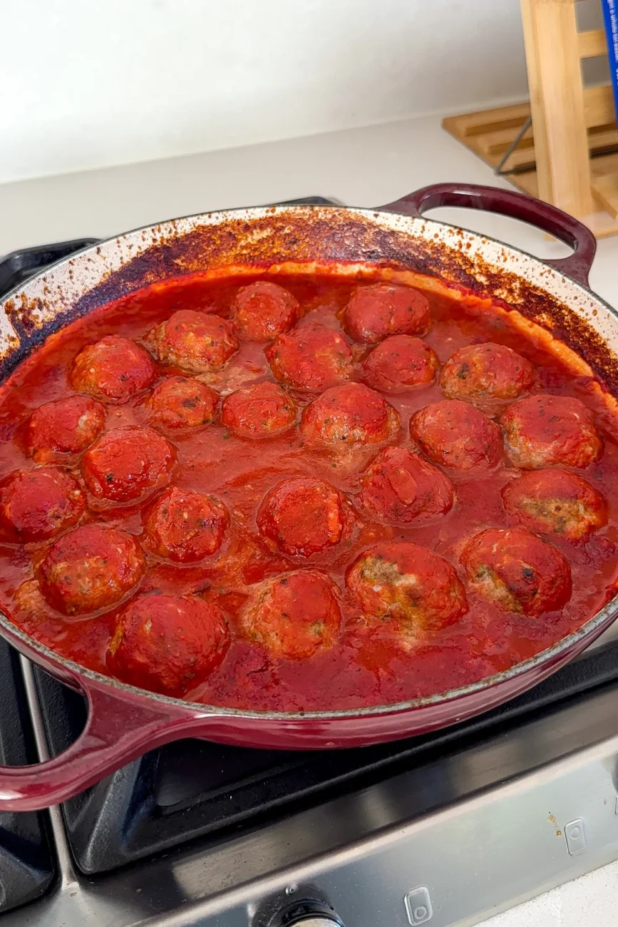 meatballs added to sauce and baked